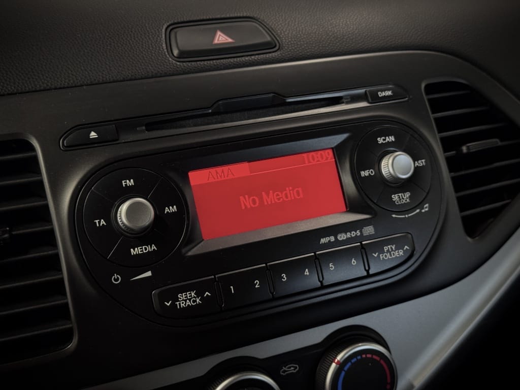 Kia Picanto — foto 18