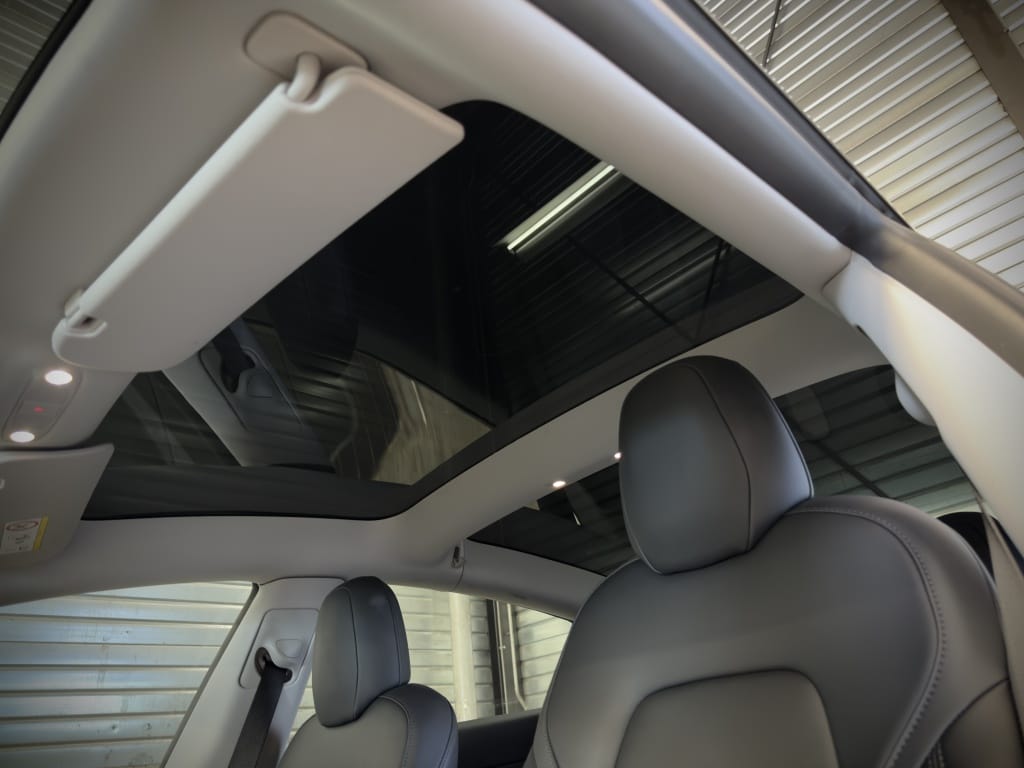 Tesla Model 3 — foto 8